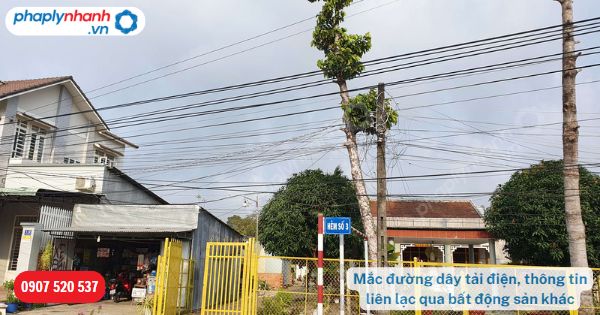 Mắc đường dây tải điện, thông tin liên lạc qua bất động sản khác-Hỗ trợ, tư vấn pháp lý nhanh